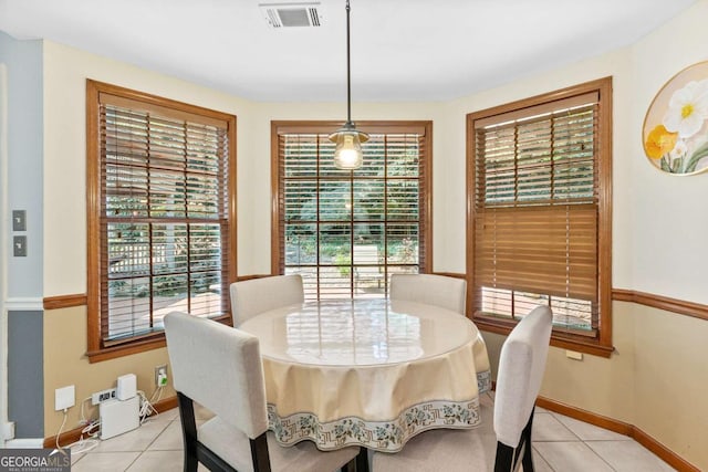 570 Hunt River Way, Suwanee, GA 30024 - dining space featuring light tile patterned floors and baseboards