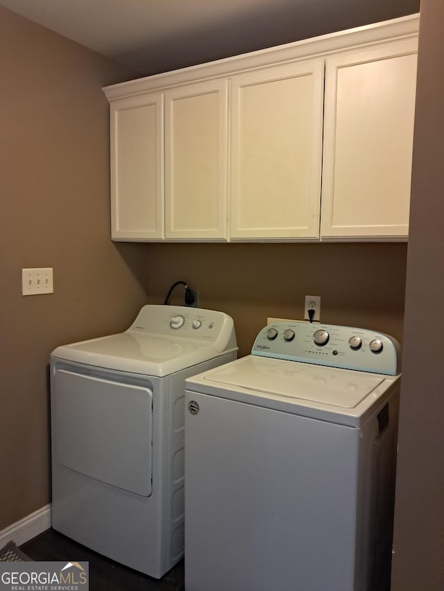 105 Deer Forest Trl, Macon, GA 31216 - washroom featuring cabinet space, independent washer and dryer, and baseboards