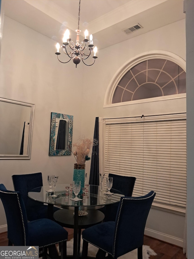 105 Deer Forest Trl, Macon, GA 31216 - dining space featuring a chandelier, wood finished floors, baseboards, and a tray ceiling