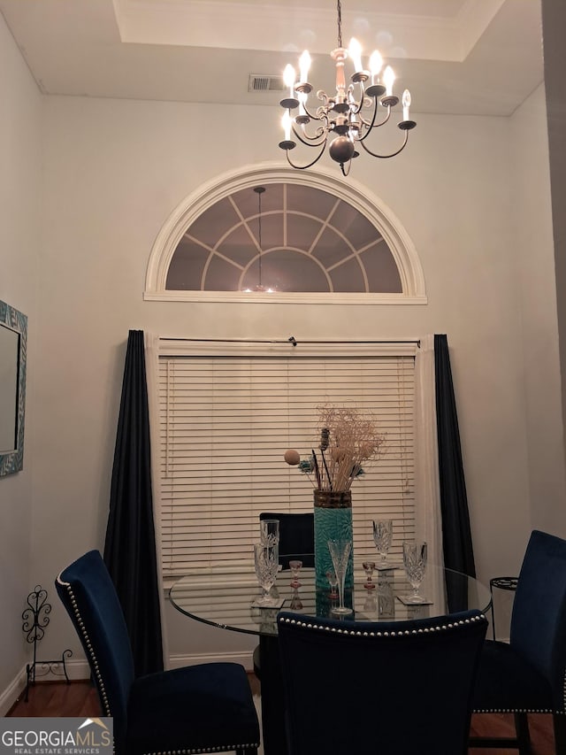 105 Deer Forest Trl, Macon, GA 31216 - dining area featuring a chandelier and a raised ceiling