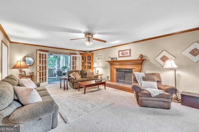 241 Tweed Ct, Sugar Hill, GA 30518 - living area featuring carpet, ornamental molding, a fireplace, and ceiling fan