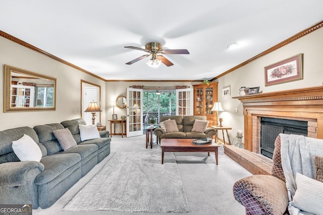 241 Tweed Ct, Sugar Hill, GA 30518 - carpeted living room with a ceiling fan, ornamental molding, and a fireplace