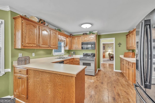 241 Tweed Ct, Sugar Hill, GA 30518 - kitchen with black microwave, white gas range oven, refrigerator with ice dispenser, a peninsula, and light wood finished floors