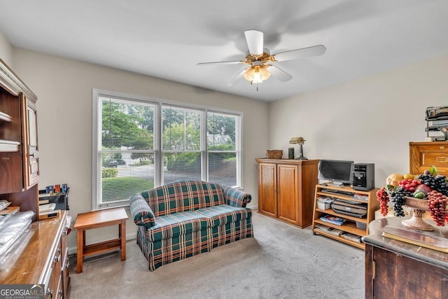 241 Tweed Ct, Sugar Hill, GA 30518 - living room featuring ceiling fan, light colored carpet, and a desk
