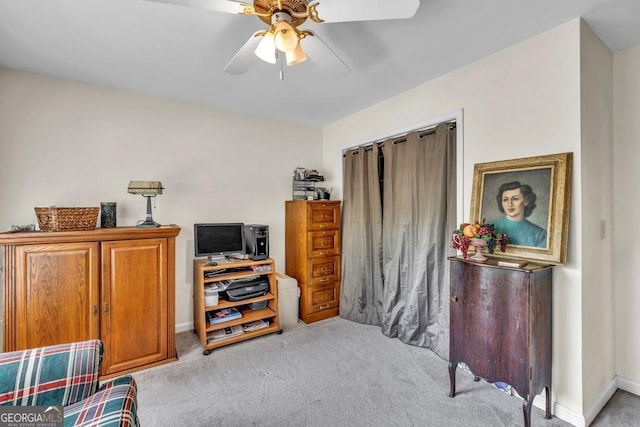 241 Tweed Ct, Sugar Hill, GA 30518 - living area featuring carpet floors and a ceiling fan