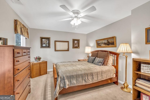 241 Tweed Ct, Sugar Hill, GA 30518 - bedroom featuring light colored carpet and a ceiling fan