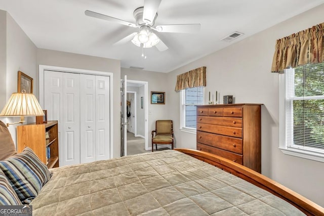 241 Tweed Ct, Sugar Hill, GA 30518 - bedroom featuring a closet and a ceiling fan
