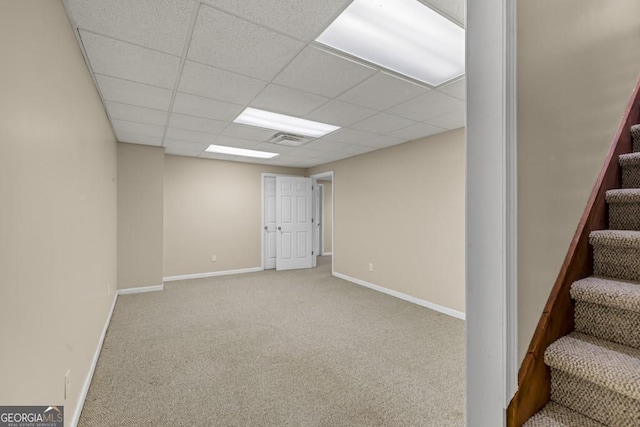 241 Tweed Ct, Sugar Hill, GA 30518 - basement featuring stairs, carpet, and a paneled ceiling