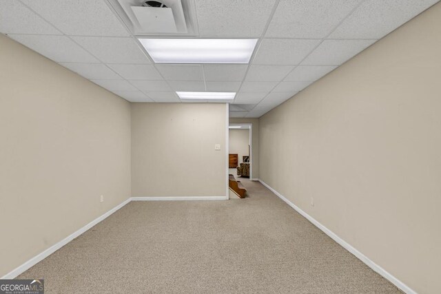 241 Tweed Ct, Sugar Hill, GA 30518 - finished basement featuring carpet floors and a paneled ceiling