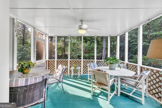241 Tweed Ct, Sugar Hill, GA 30518 - sunroom featuring outdoor dining area and ceiling fan
