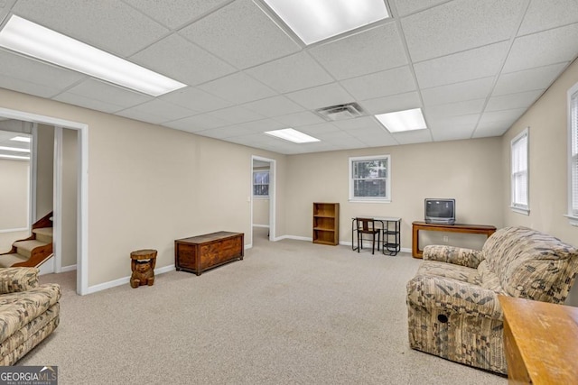 241 Tweed Ct, Sugar Hill, GA 30518 - carpeted living area with a drop ceiling and stairway