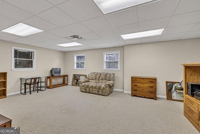 241 Tweed Ct, Sugar Hill, GA 30518 - living area with carpet flooring and a paneled ceiling