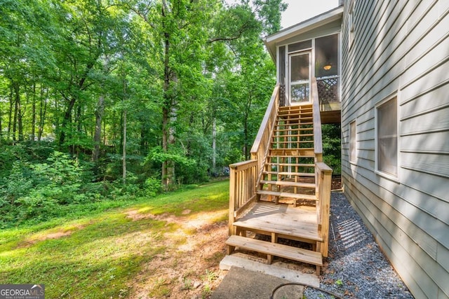 241 Tweed Ct, Sugar Hill, GA 30518 - wooden deck with stairs and a sunroom
