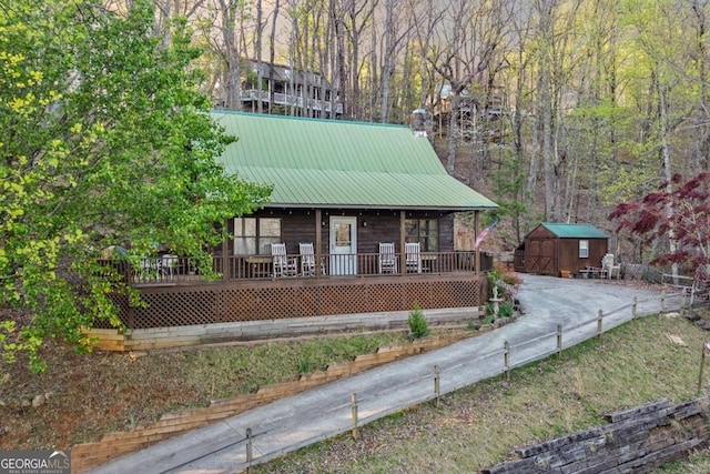 87 Owltown Dr Unit L40, Ellijay, GA 30536 - rustic home featuring a porch and metal roof