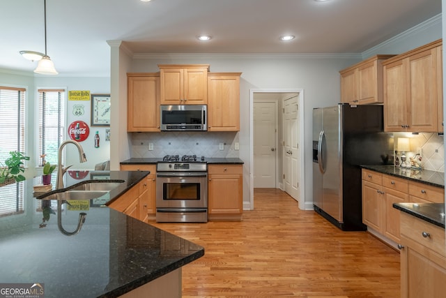 300 Brackin Trce, Grayson, GA 30017 - kitchen with stainless steel appliances, ornamental molding, light brown cabinets, light wood-type flooring, and decorative backsplash