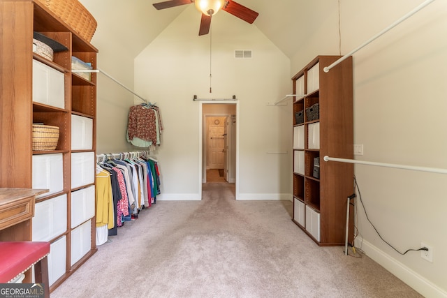 300 Brackin Trce, Grayson, GA 30017 - spacious closet featuring light colored carpet, a ceiling fan, and high vaulted ceiling