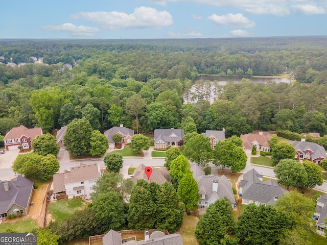 300 Brackin Trce, Grayson, GA 30017 - aerial view of residential area with a heavily wooded area and a nearby body of water