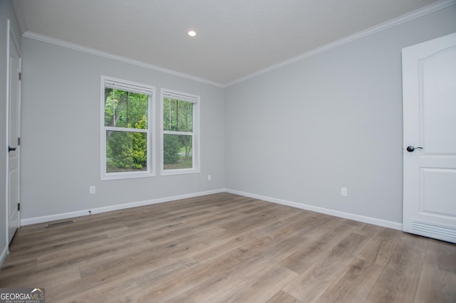 74 Preacher Smith Rd SE, Silver Creek, GA 30173 - unfurnished room featuring crown molding, baseboards, light wood-style flooring, and recessed lighting