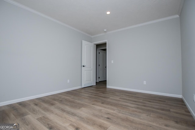 74 Preacher Smith Rd SE, Silver Creek, GA 30173 - unfurnished room featuring crown molding, baseboards, wood finished floors, and recessed lighting