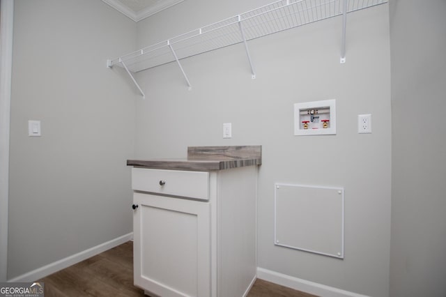 74 Preacher Smith Rd SE, Silver Creek, GA 30173 - laundry room with hookup for a washing machine, ornamental molding, dark wood-type flooring, and baseboards