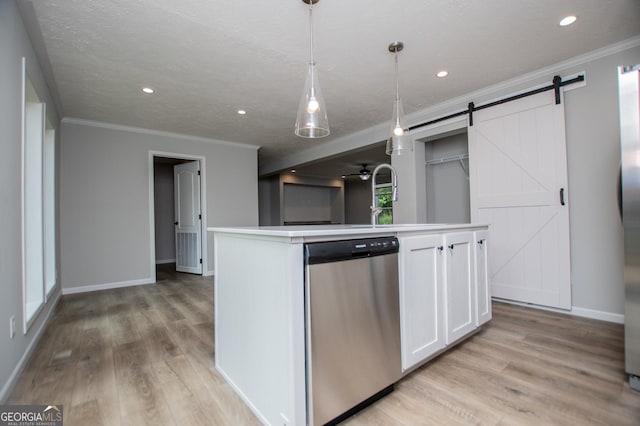 74 Preacher Smith Rd SE, Silver Creek, GA 30173 - kitchen with stainless steel dishwasher, crown molding, a center island with sink, light wood-style floors, and white cabinets