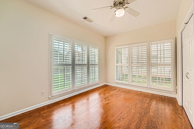 1713 Paramore Pl NE, Marietta, GA 30062 - unfurnished room featuring ceiling fan and wood finished floors