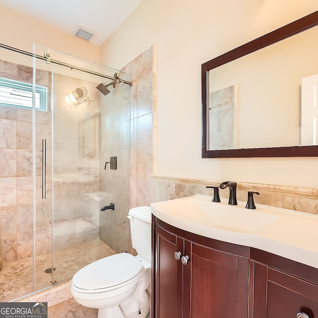 1713 Paramore Pl NE, Marietta, GA 30062 - full bath featuring vanity, a stall shower, and tile walls