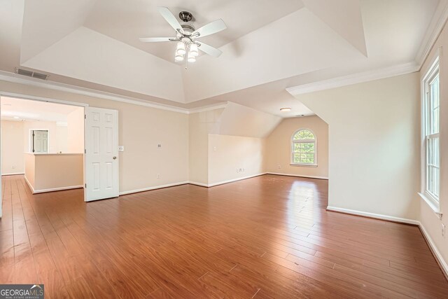 1713 Paramore Pl NE, Marietta, GA 30062 - unfurnished living room featuring vaulted ceiling, ceiling fan, and wood finished floors