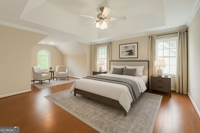 1713 Paramore Pl NE, Marietta, GA 30062 - bedroom with light wood-style flooring, ceiling fan, a tray ceiling, lofted ceiling, and ornamental molding