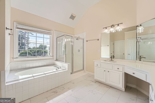 1713 Paramore Pl NE, Marietta, GA 30062 - full bathroom featuring vanity, a bath, a shower stall, lofted ceiling, and marble finish flooring