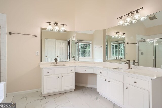 1713 Paramore Pl NE, Marietta, GA 30062 - bathroom with a stall shower, marble look tiles, and double vanity