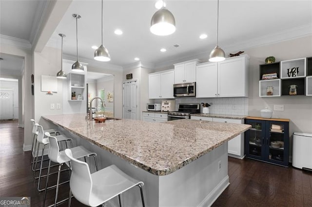 17 Twelve Oaks Dr, Cartersville, GA 30120 - kitchen with stainless steel appliances, open shelves, a sink, tasteful backsplash, and crown molding