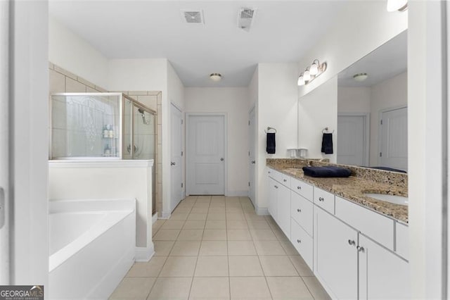 17 Twelve Oaks Dr, Cartersville, GA 30120 - full bath featuring a stall shower, tile patterned floors, double vanity, a bath, and baseboards