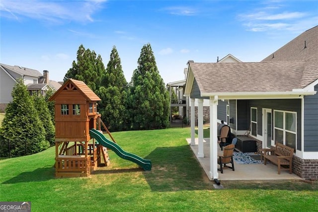 17 Twelve Oaks Dr, Cartersville, GA 30120 - view of play area featuring a patio and a lawn
