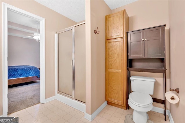 11 Chestnut St, Cartersville, GA 30120 - bathroom featuring a stall shower, ensuite bathroom, ceiling fan, and tile patterned floors