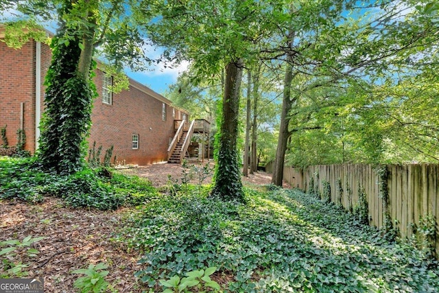 11 Chestnut St, Cartersville, GA 30120 - view of yard with stairway and a wooden deck