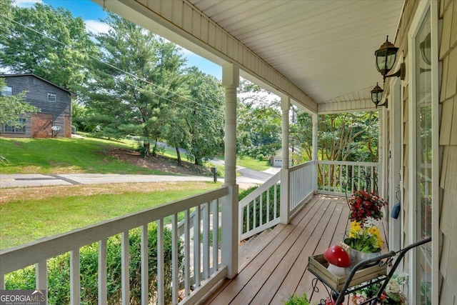 11 Chestnut St, Cartersville, GA 30120 - wooden porch with a yard