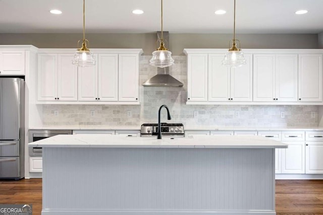 12 Bridgestone Way SE, Cartersville, GA 30120 - kitchen with freestanding refrigerator, white cabinets, tasteful backsplash, dark wood finished floors, and recessed lighting