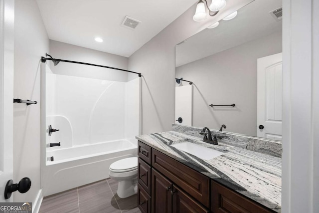 12 Bridgestone Way SE, Cartersville, GA 30120 - bathroom featuring toilet, vanity, bathing tub / shower combination, recessed lighting, and tile patterned floors