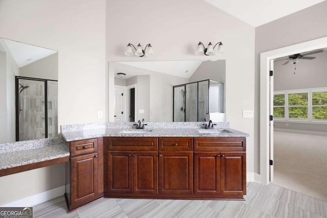 12 Bridgestone Way SE, Cartersville, GA 30120 - bathroom featuring vaulted ceiling, a shower stall, double vanity, a ceiling fan, and baseboards