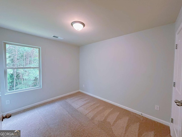 1531 Iris Walk, Jonesboro, GA 30238 - carpeted empty room featuring baseboards