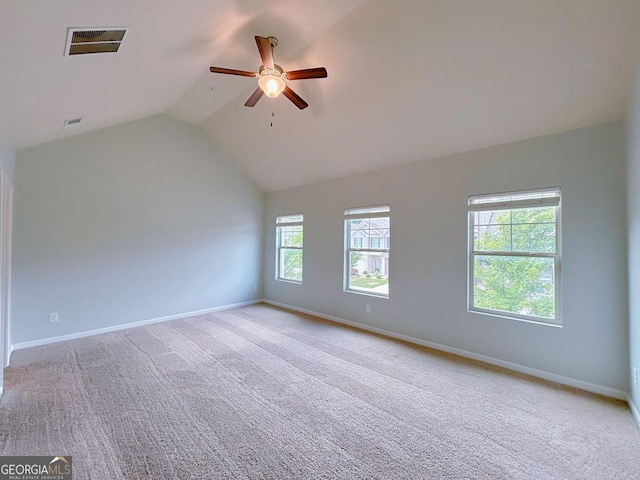1531 Iris Walk, Jonesboro, GA 30238 - empty room with ceiling fan, lofted ceiling, carpet flooring, and baseboards