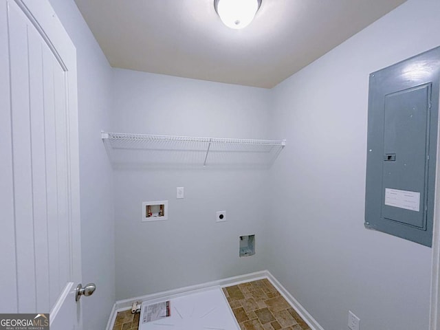 1531 Iris Walk, Jonesboro, GA 30238 - laundry room featuring electric panel, electric dryer hookup, washer hookup, and baseboards