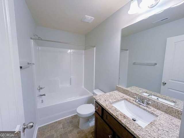 1531 Iris Walk, Jonesboro, GA 30238 - bathroom with vanity, toilet, tub / shower combination, and stone finish floors