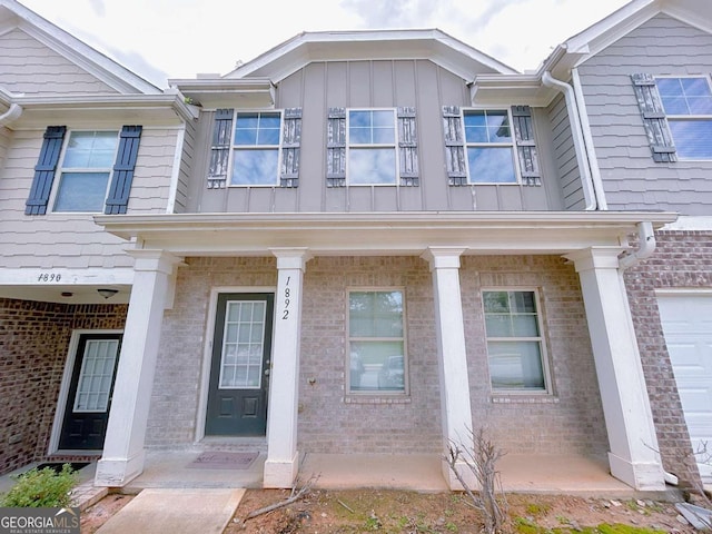 1892 Old Dogwood, Jonesboro, GA 30238 - view of front of house with board and batten siding and brick siding