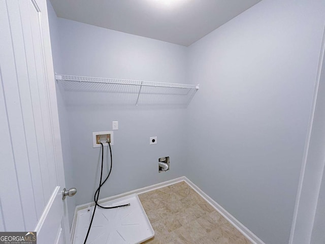 1892 Old Dogwood, Jonesboro, GA 30238 - laundry room with washer hookup, hookup for an electric dryer, and baseboards