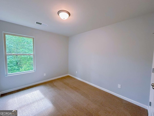 1892 Old Dogwood, Jonesboro, GA 30238 - empty room with baseboards and carpet floors