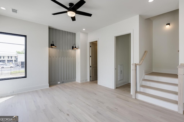 1962 8th St, Chamblee, GA 30341 - unfurnished living room featuring wood finished floors, recessed lighting, ceiling fan, baseboards, and stairs