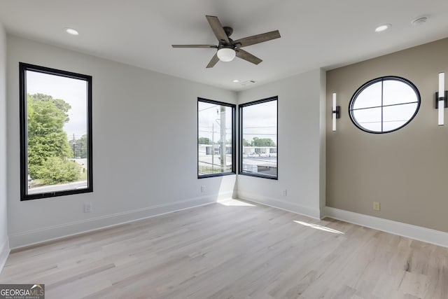 1962 8th St, Chamblee, GA 30341 - empty room featuring light wood-style flooring, a ceiling fan, recessed lighting, baseboards, and a smoke detector