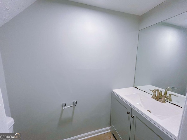 1820 Neely Ave, Atlanta, GA 30344 - bathroom with vanity, toilet, and baseboards